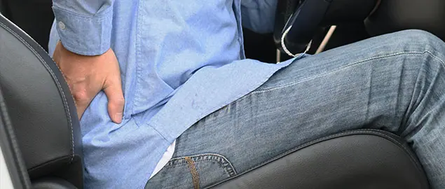 patient with back injury needing auto accident chiropractor in La Verne