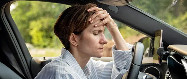 patient with headache needing auto accident chiropractor in La Verne, CA
